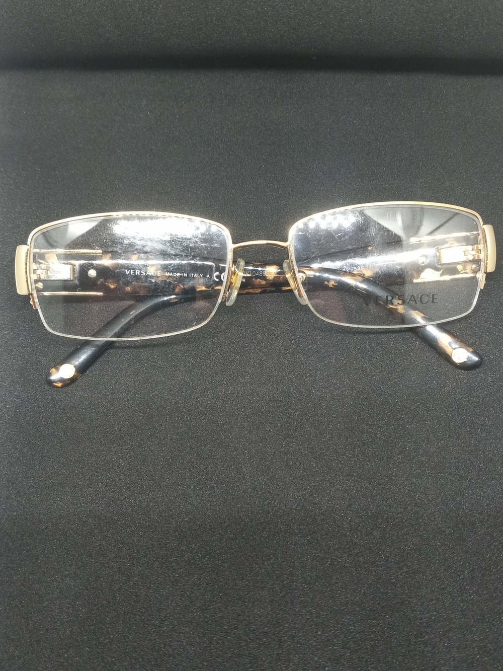 Versace Black Logo Detail - Sleek Designer Accent